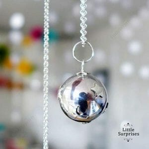 Silver ball pendant with stars